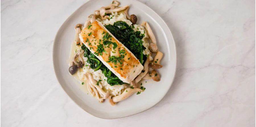 Seared Halibut over Spinach, Mushrooms, and Risotto