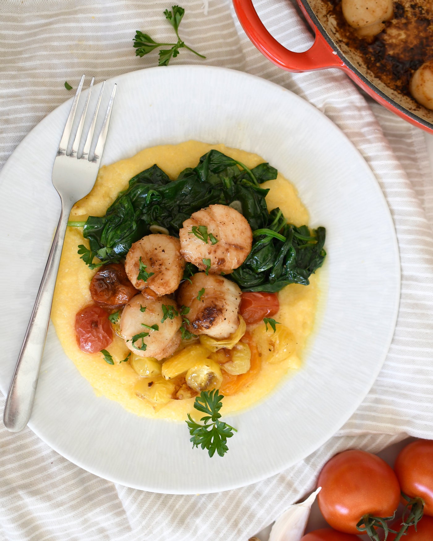 Pan-Seared Sea Scallops with Tomatoes & Spinach over Polenta