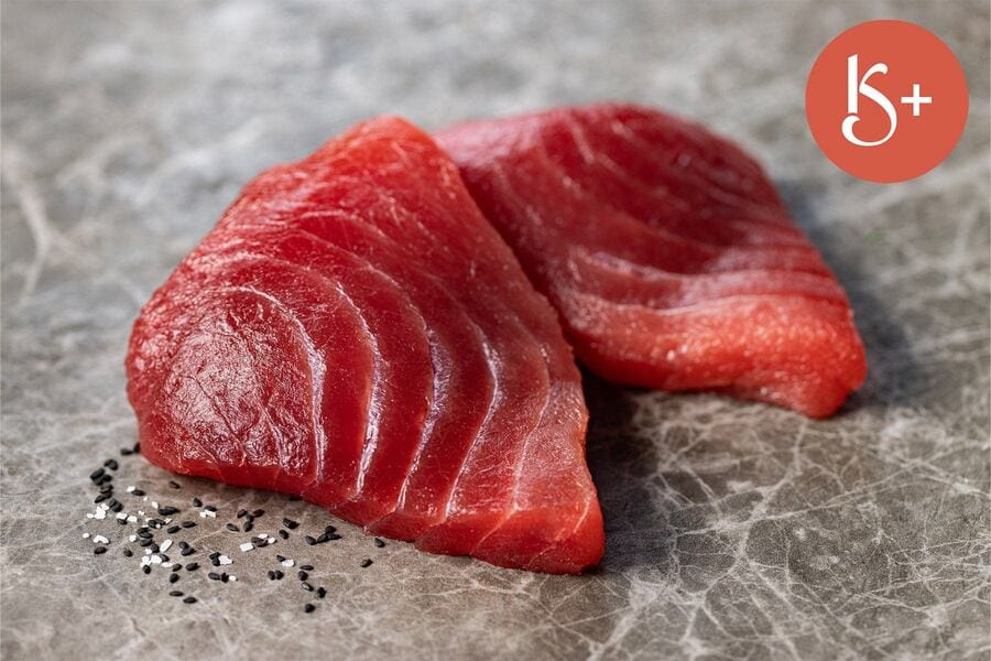 two raw yellowfin tuna steaks