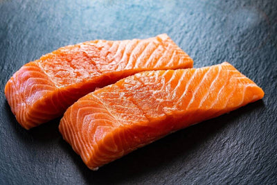 two raw norwegian salmon portions