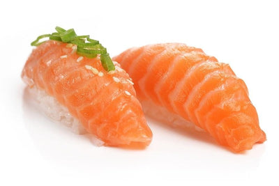 two pieces of raw norwegian salmon sushi