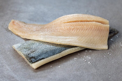 two raw rainbow trout fillets
