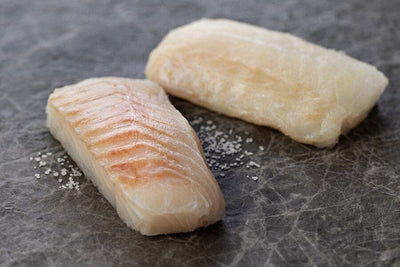 two raw wild icelandic cod portions