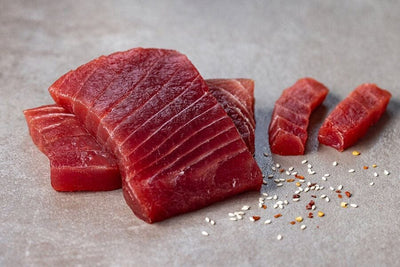 chunks of raw yellowfin tuna saku