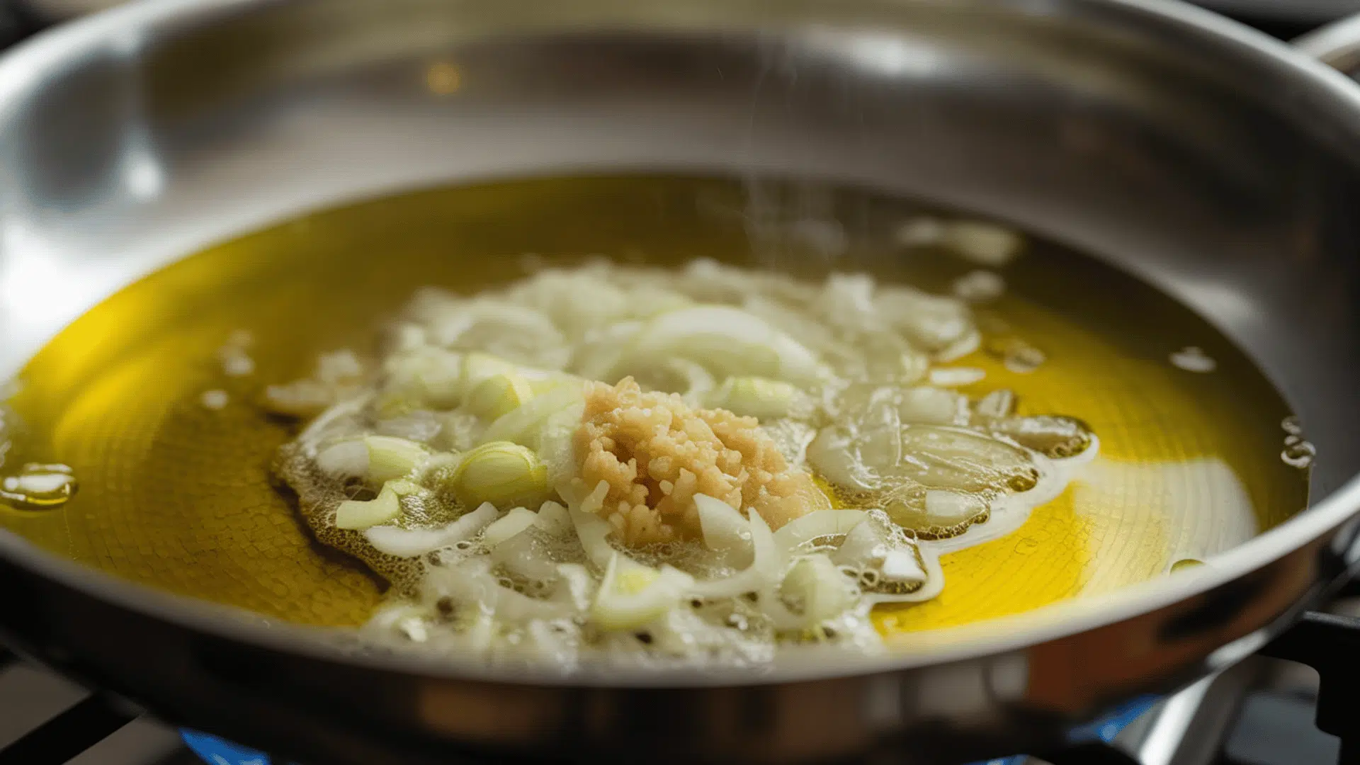 step 1 preparing the base with onion garlic and oil