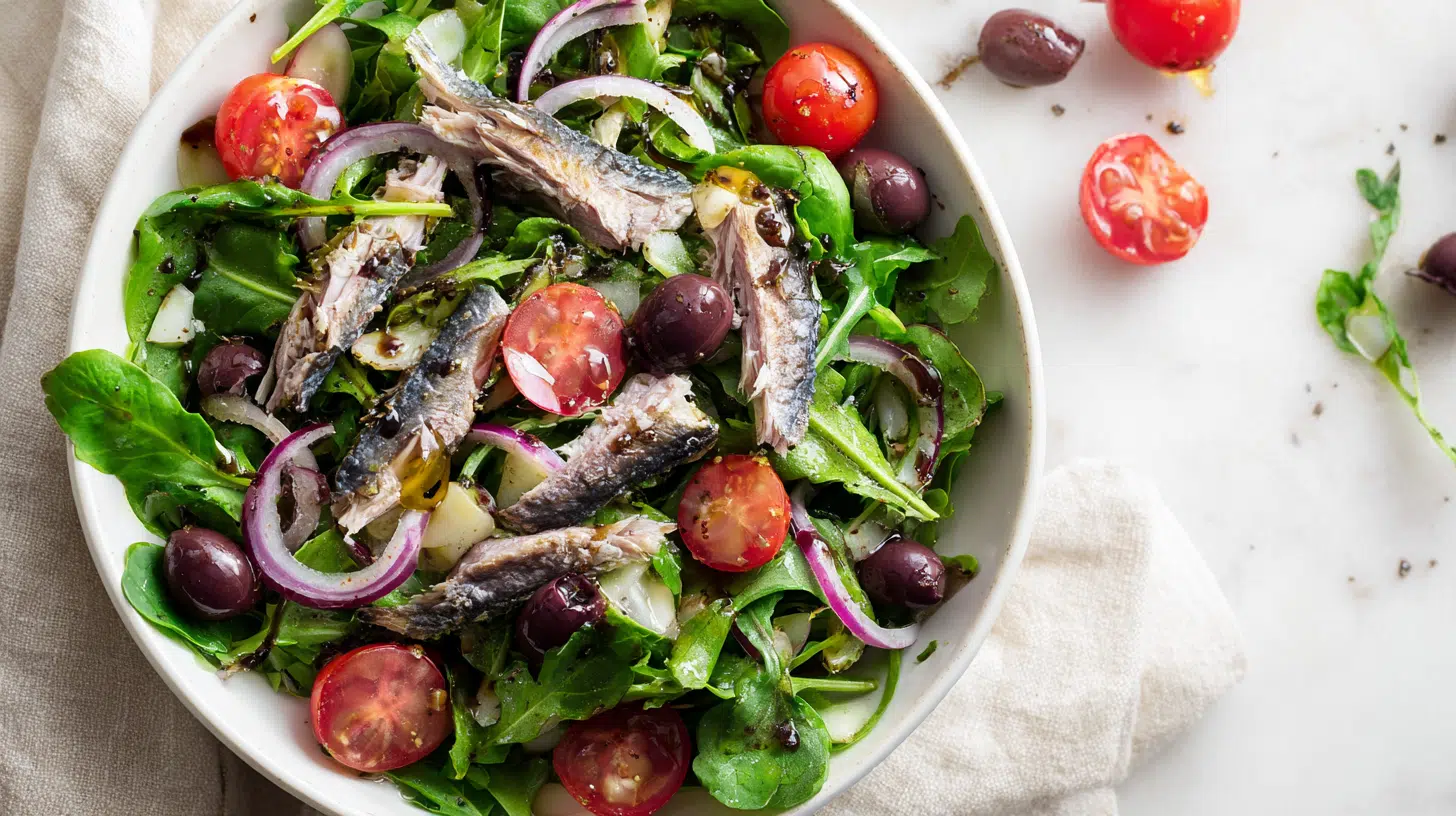 sardines over mixed greens