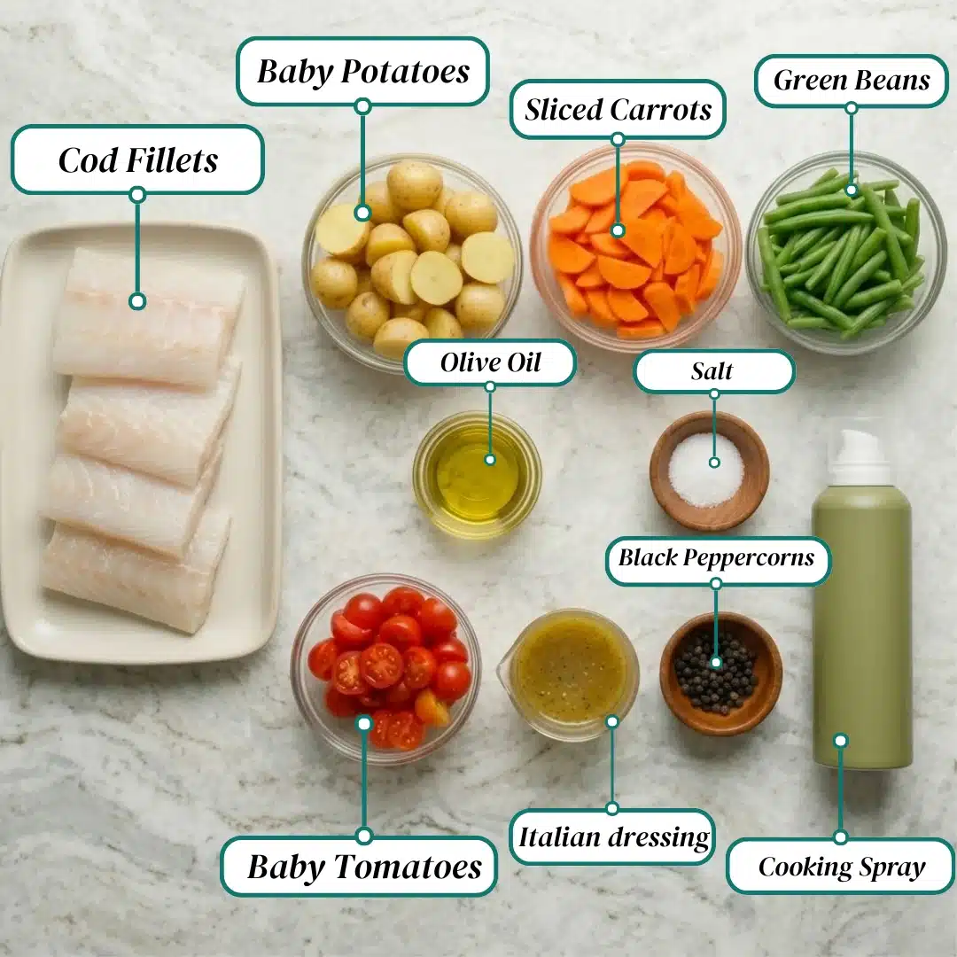 Fresh cod fillets baby potatoes carrots and green beans with tomatoes oil and seasonings on a marble counter top layout